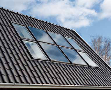Capteur solaire plat intégré dans couverture inclinée